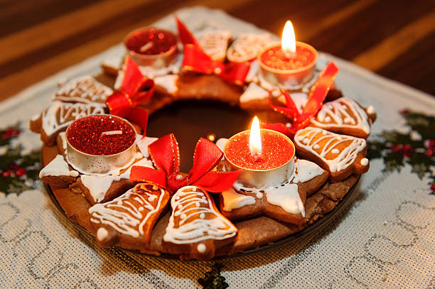 Advent wreath with candles in flame stock photo