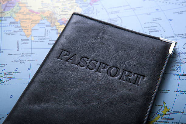 istock passport in the bag on a map 530089753