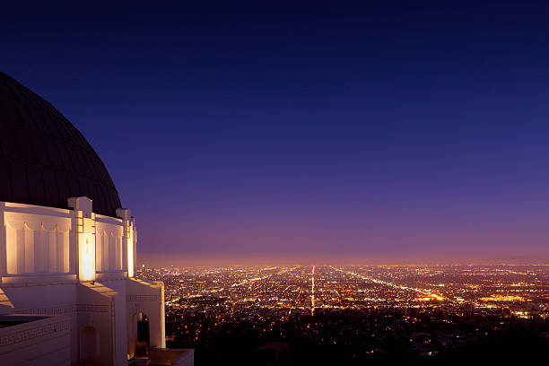 Griffith Park Observatory in Los Angeles View over Los Angeles at the Griffith Park Observatory. griffith park observatory stock pictures, royalty-free photos & images