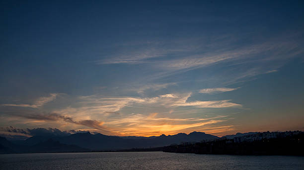 istock sunset behind of mountains 530099871