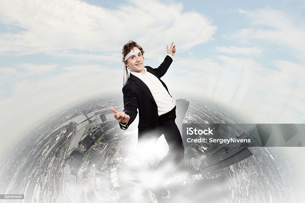 Cheerful businessman Young funny businessman wearing tie around head Adult Stock Photo