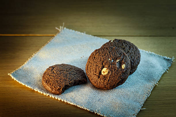 istock Chocolate chip cookies on wooden background 530101515