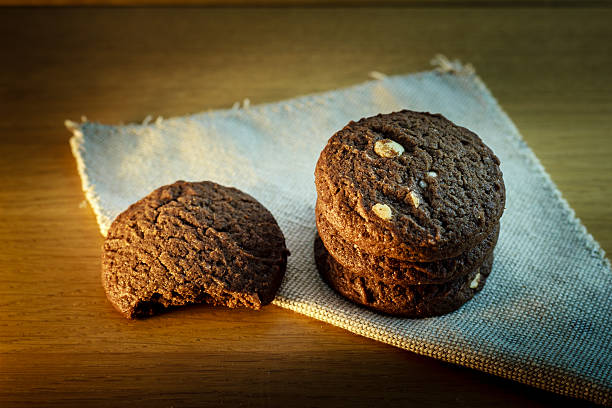 istock Chocolate chip cookies on wooden background 530101517