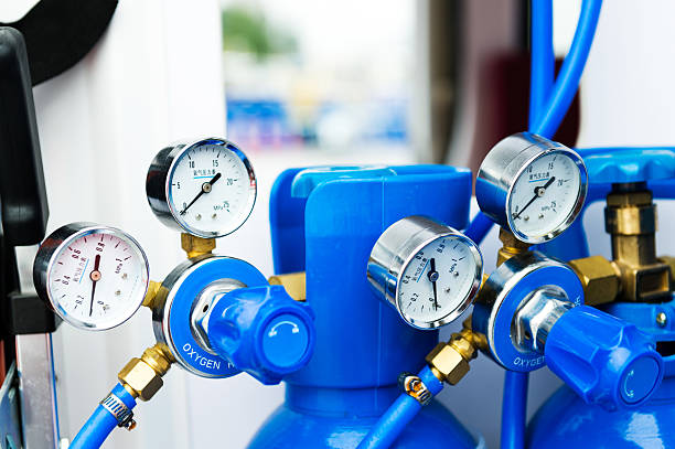 Oxygen meter Pressure gauge on an oxygen tank. medical oxygen stock pictures, royalty-free photos & images
