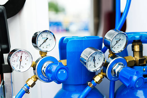 Oxygen meter Pressure gauge on an oxygen tank. oxygen tank stock pictures, royalty-free photos & images