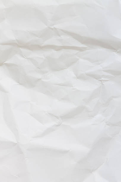 istock Close up crumpled white paper background 530102325