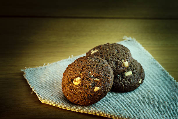 istock Chocolate chip cookies on wooden background 530102595