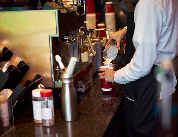 coffee shop staff making coffee