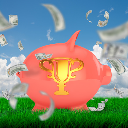 piggy bank with Trophy on nature background