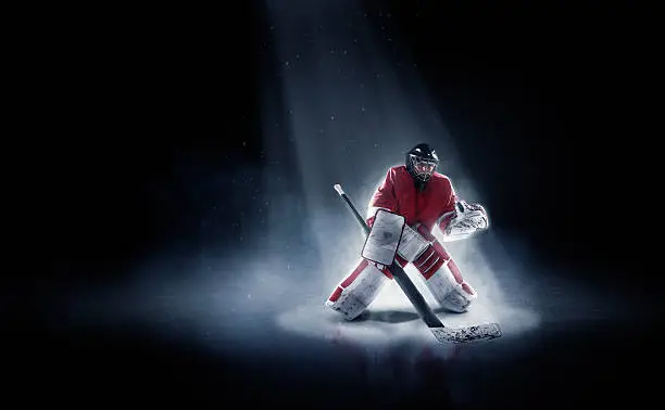 Ice hockey goalie in spotlight - advertising