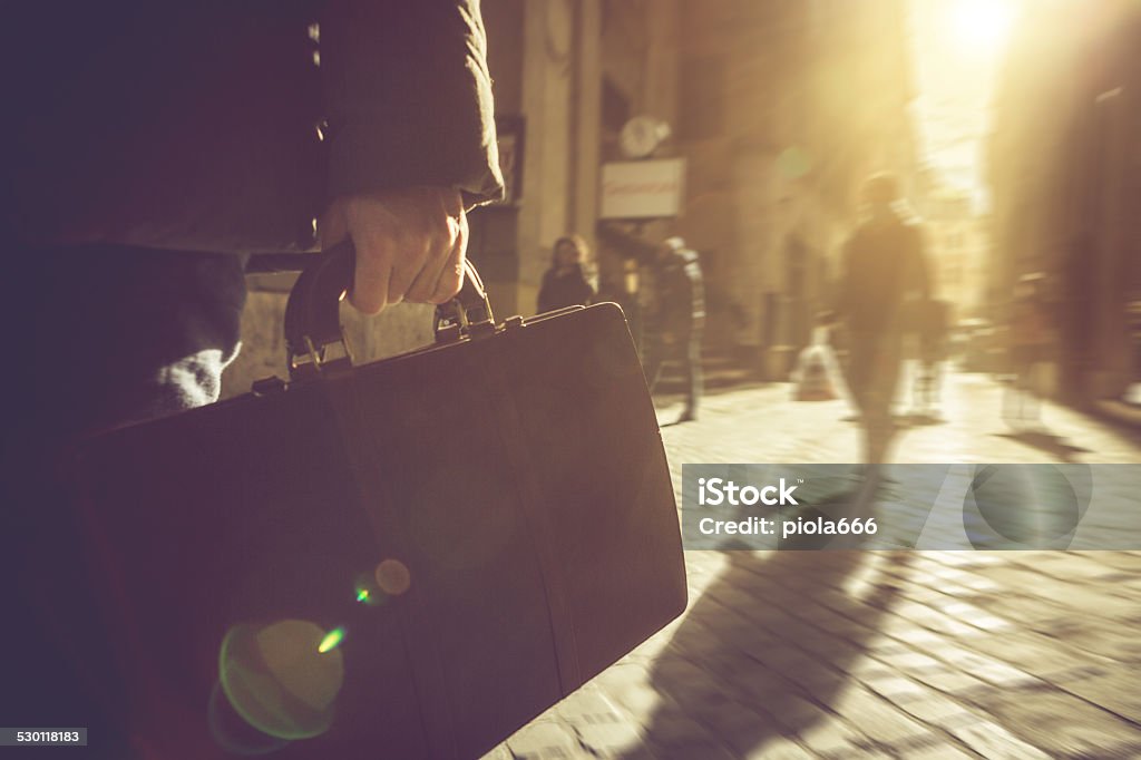 Business person walking with briefcase in Rome Adult Stock Photo