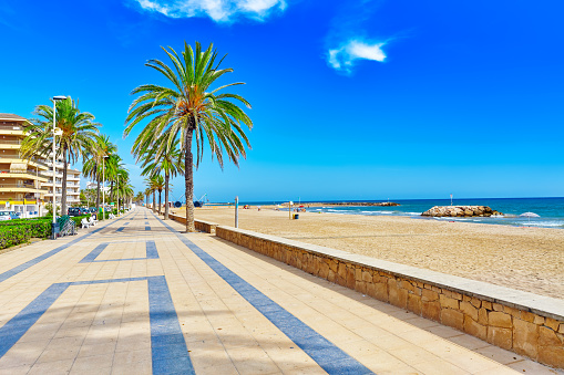 In september 2022, tourists were enjoying the sun on the beach of Platja de ses Figueretes in Ibiza on Balearic Islands in Spain.