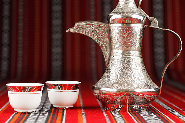 istock Ornate Arabian tea cups and a dallah tea pot 530122269