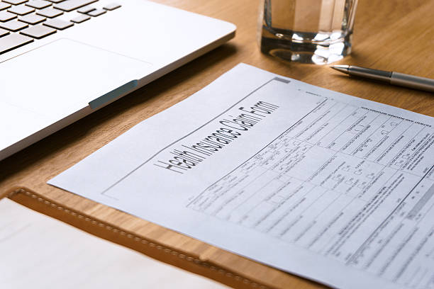 istock health Insurance claim form on table 530158067