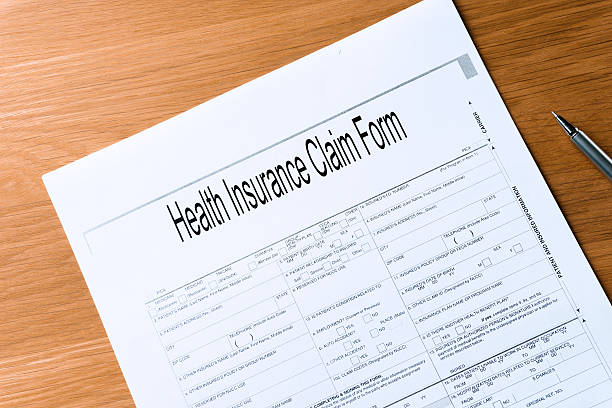 istock health Insurance claim form on table 530158461