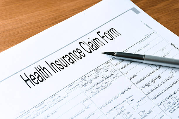 istock health Insurance claim form on table 530158465