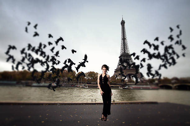 istock girl and a flock of crows 530160407