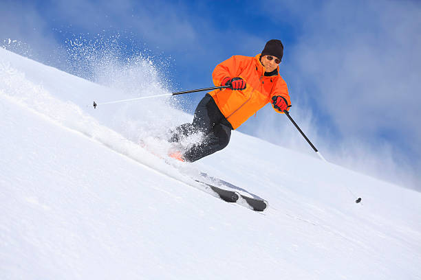 istock Senior men snow skier skiing on sunny ski resorts 530161943
