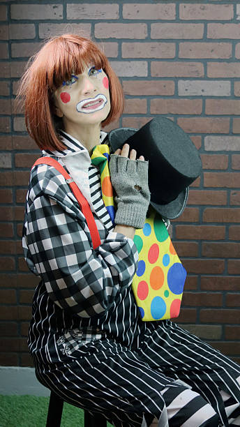 istock Senior Adult Female Clown In A Dramatic Pose 530182259