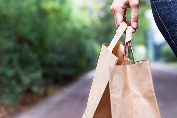 istock shopping bags in hand 530182385