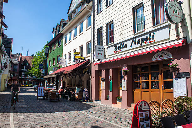 Frankfurt, Germany - May 5, 2013: Picturesque Sachsenhausen disctrict in Frankfurt, Germany. Frankfurt is the fifth-largest city in Germany, with a population of 687,775.