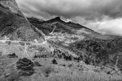 Beautiful famous curvy roads on Old Silk Route, Silk trading route between China and India, Sikkim - black and white image