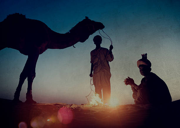 istock Two Indigenous Indian Men Resting By The Bon Fire Concept 530183238