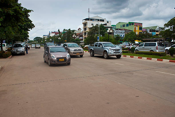 Vientiane, Laos - August 20, 2012: Traffic on Lane Xang avenue in Vientiane, Laos. The estimated population of the city is 754,000.