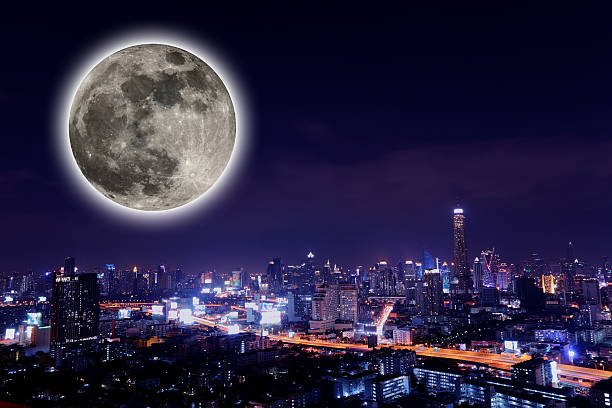 istock The View city at night with full moon. 530183678
