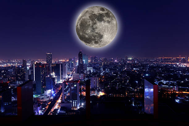 istock The View city at night with full moon. 530183788