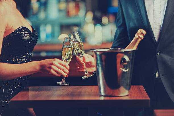 istock couple enjoying champagne 530183882