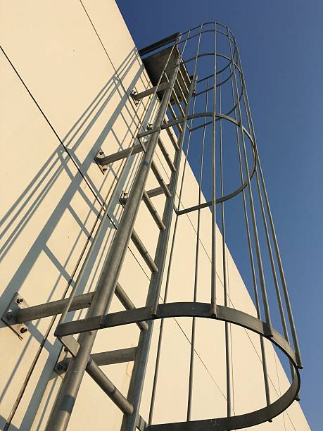 istock climb the ladder on the roof 530185426