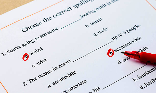 english spelling vocabulary test red pen marked on multiple choices on english spelling vocabulary test misspelled stock pictures, royalty-free photos & images