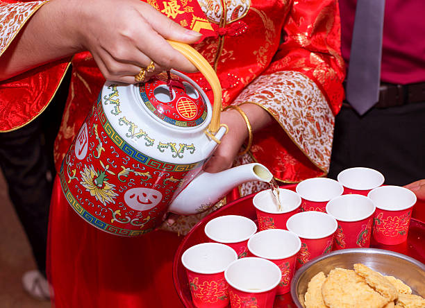 istock the bride serving the tea for the elders 530185631