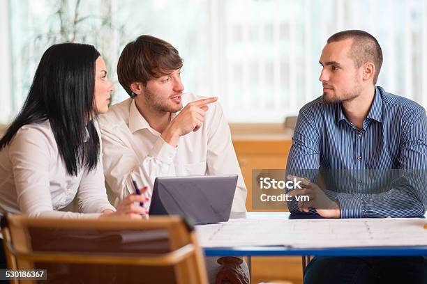 Young Business Team In The Office Stock Photo - Download Image Now - 20-24 Years, 30-34 Years, Adult