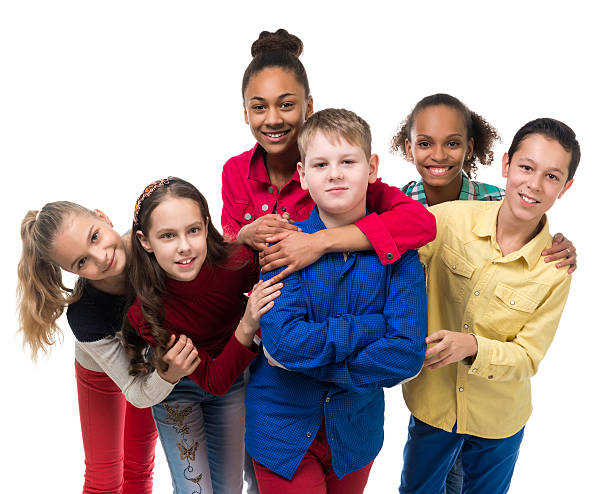 istock group of children with different complexion embracing 530190428