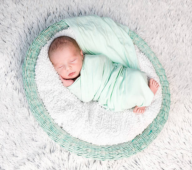 istock sweet wrapped in a nappy newborn baby 530190670