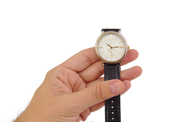 istock Man hand with watch isolated on white background 530190742