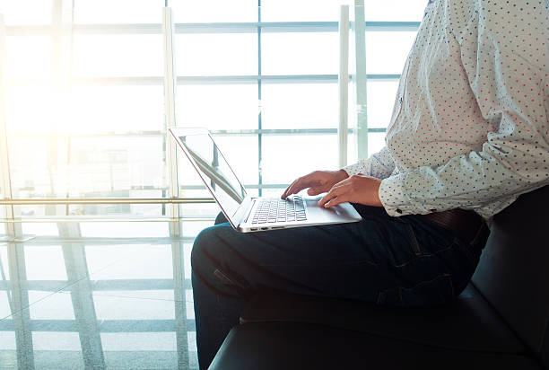 istock Businessman working in airport 530191240
