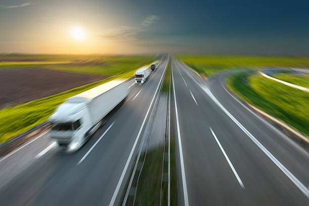 istock Motion image of modern delivery trucks on the highway 530192318