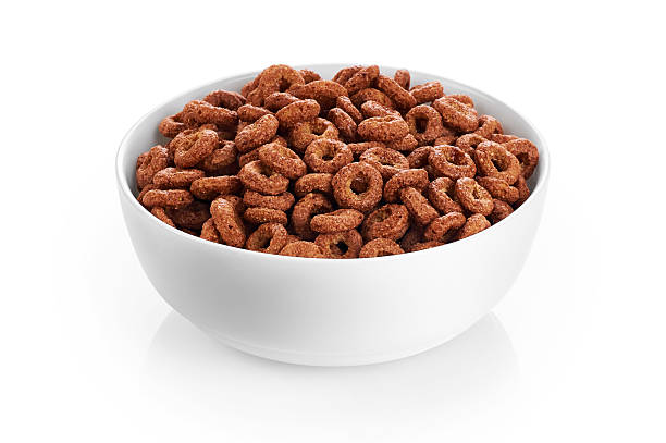 istock Bowl with chocolate corn rings isolated on white background. 530193666
