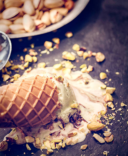 istock Homemade Pistachio Ice Cream in a Cone 530196616