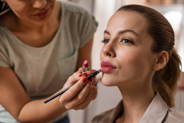 istock Young woman during make-up treatment. 530197186