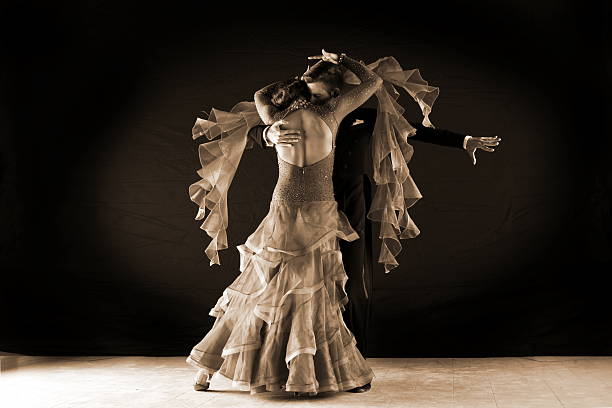 istock dancers in ballroom isolated on black background 530200963
