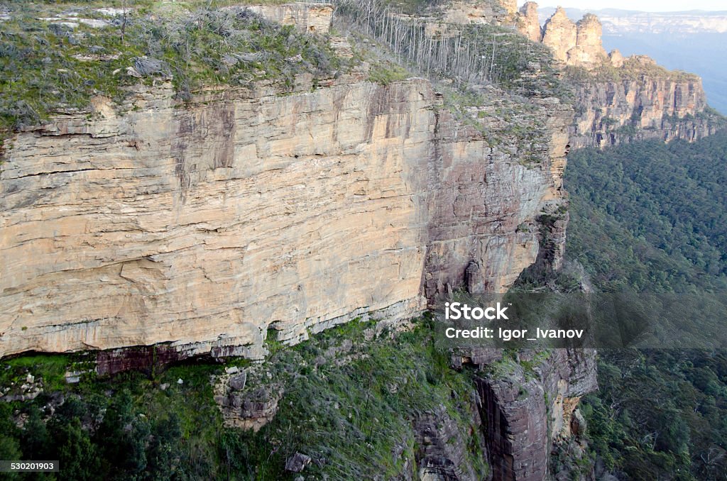 Cliffs in the Blue Mountains Cliffs in the Blue Mountains with the three sisters in the background. Australia Stock Photo