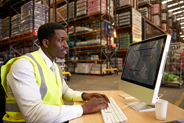 istock Manager at work in the on-site office of a warehouse 530202746