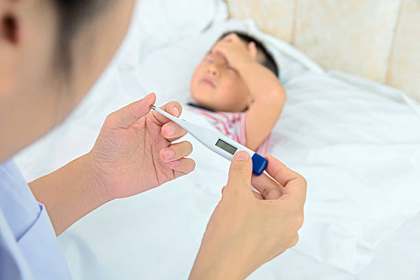 istock measure by child thermometer 530202927