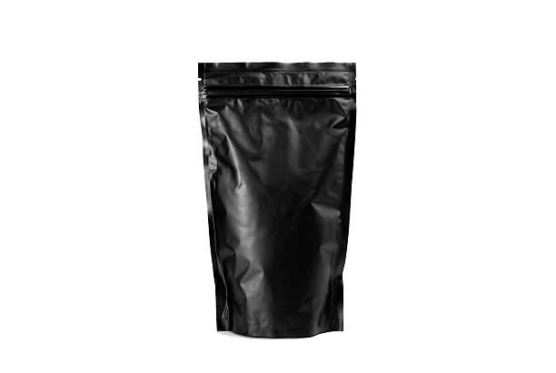 istock Black bag of coffee on a white background 530203270