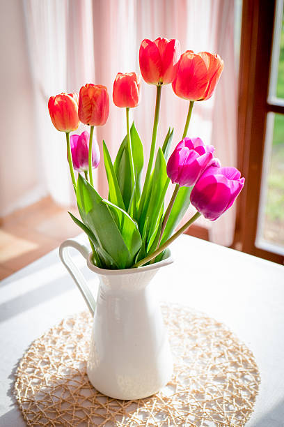 istock Tulip bouquet in a simple jar 530203360