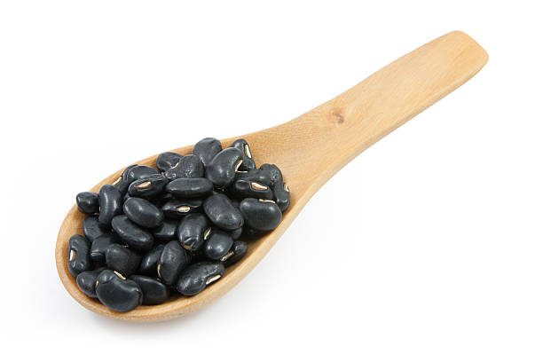 istock Black Beans on spoon wood 530204925